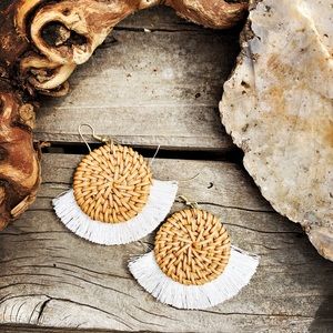 White fringed wicker discs